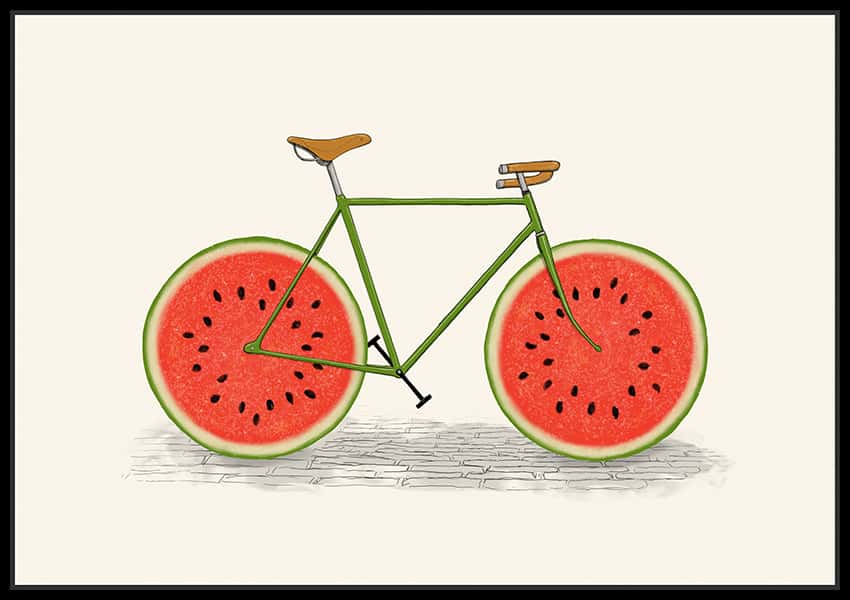 Ein Fahrrad mit Wassermelonenscheiben als Räder in einem schwarzen Schattenfugenrahmen